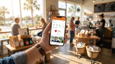 Business owner managing enterprise security from the Alarm.com app on their phone