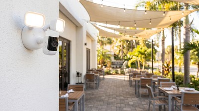 Commercial security cameras installed on the exterior of a Florida business