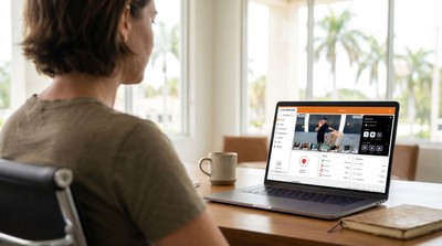 Florida business owner managing alarms across locations from a laptop