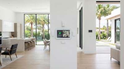 Modern security system panel and wireless sensors in a Florida home